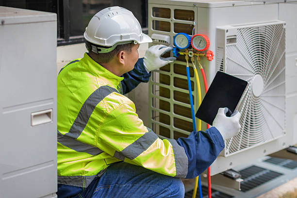 Professional Air Duct Cleaning technician working in Saint Clair, PA